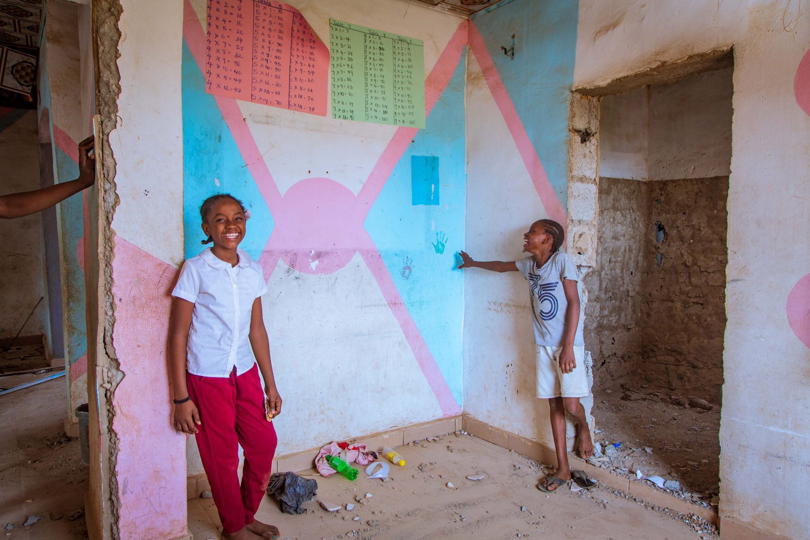children standing in newly improved charity space