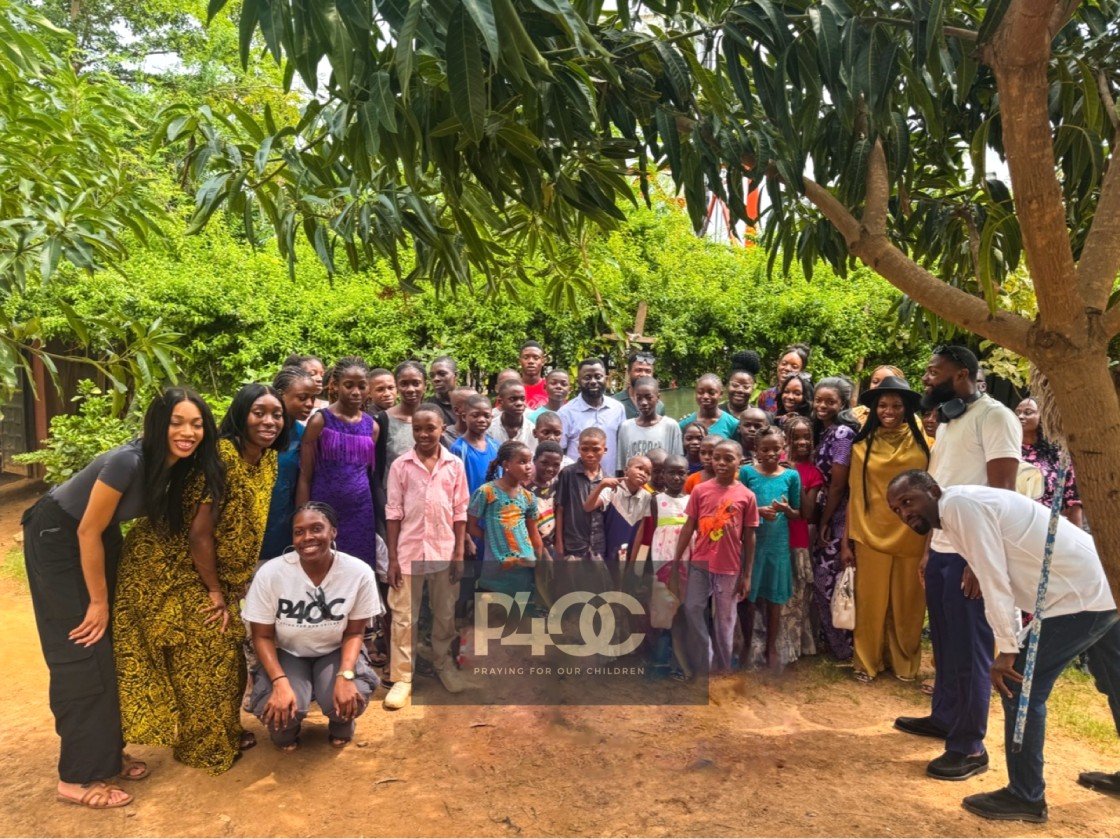 group of children and volunteers supported by P4OC charity program