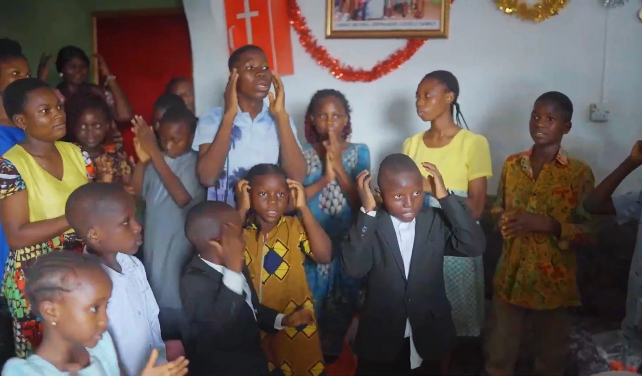children participating in charity program activities at orphanage